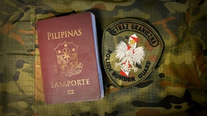  Filipiński paszport, naszywka z napisem Straży Granicznej Polish Border Guard