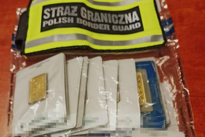 Opaska z napisem Straż Graniczna. Małe sztabki złota.